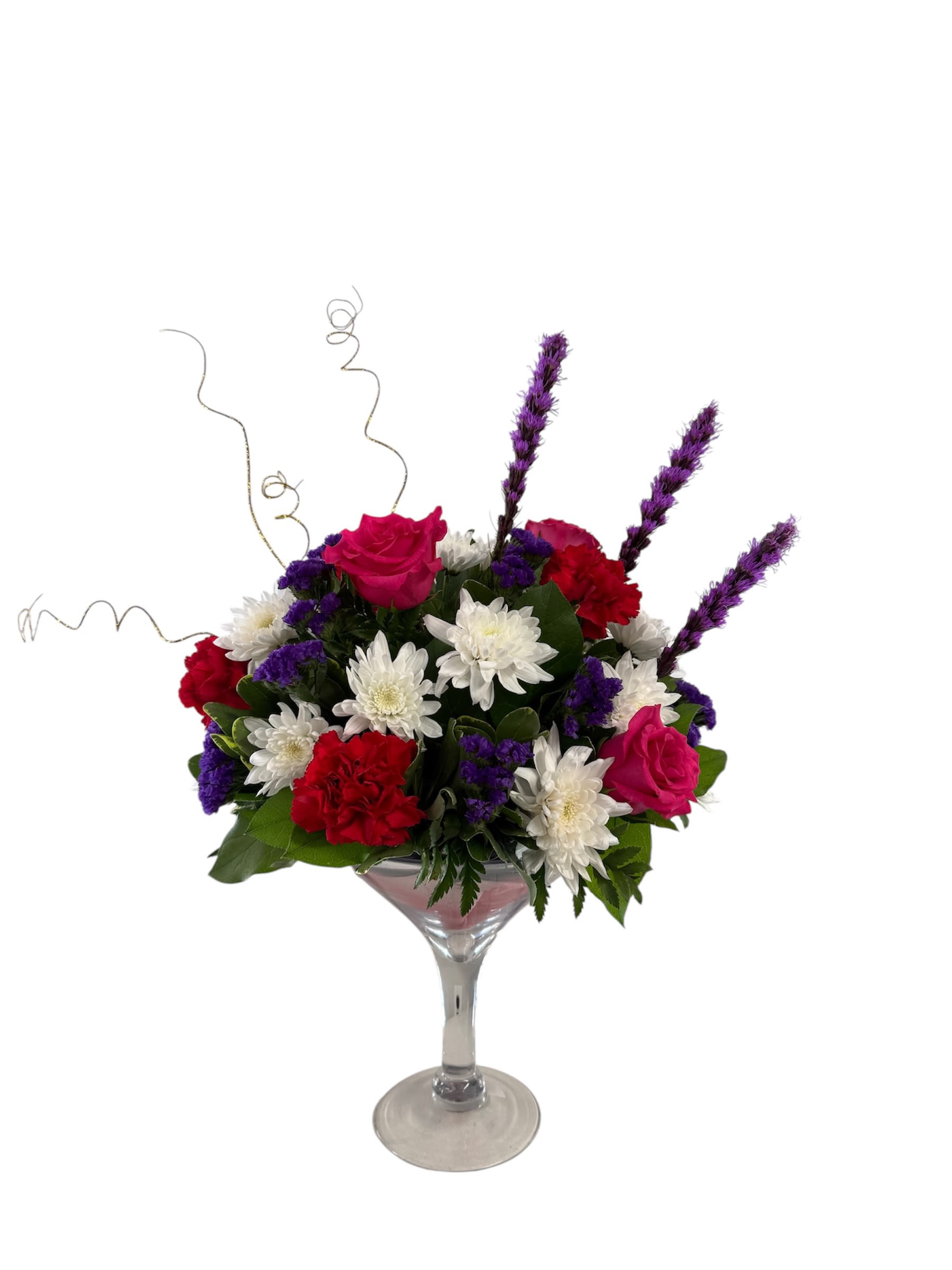 Mixed bouquet in a martini glass with pink roses, white daisies, and red carnations