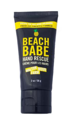 Black tube of Beach Babe hand rescue cream with yellow text