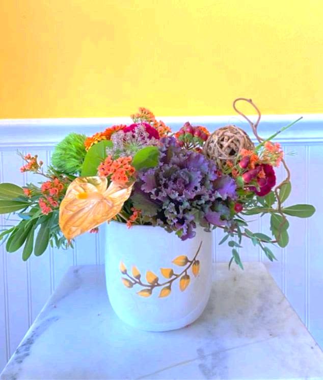 Autumn Fields - Transform Your Space with Elegance!  Introducing our stunning white vase, adorned with a delicate golden leaf pattern. Perfect for showcasing a vibrant medley of fresh flowers, this elegant piece brings a touch of sophistication and freshness to any room. Whether as a centerpiece or a thoughtful gift, it’s sure to brighten up your day and elevate your decor.   Order now and add a touch of nature’s beauty to your home! Approx Dimensions 21 in X 21 inch 