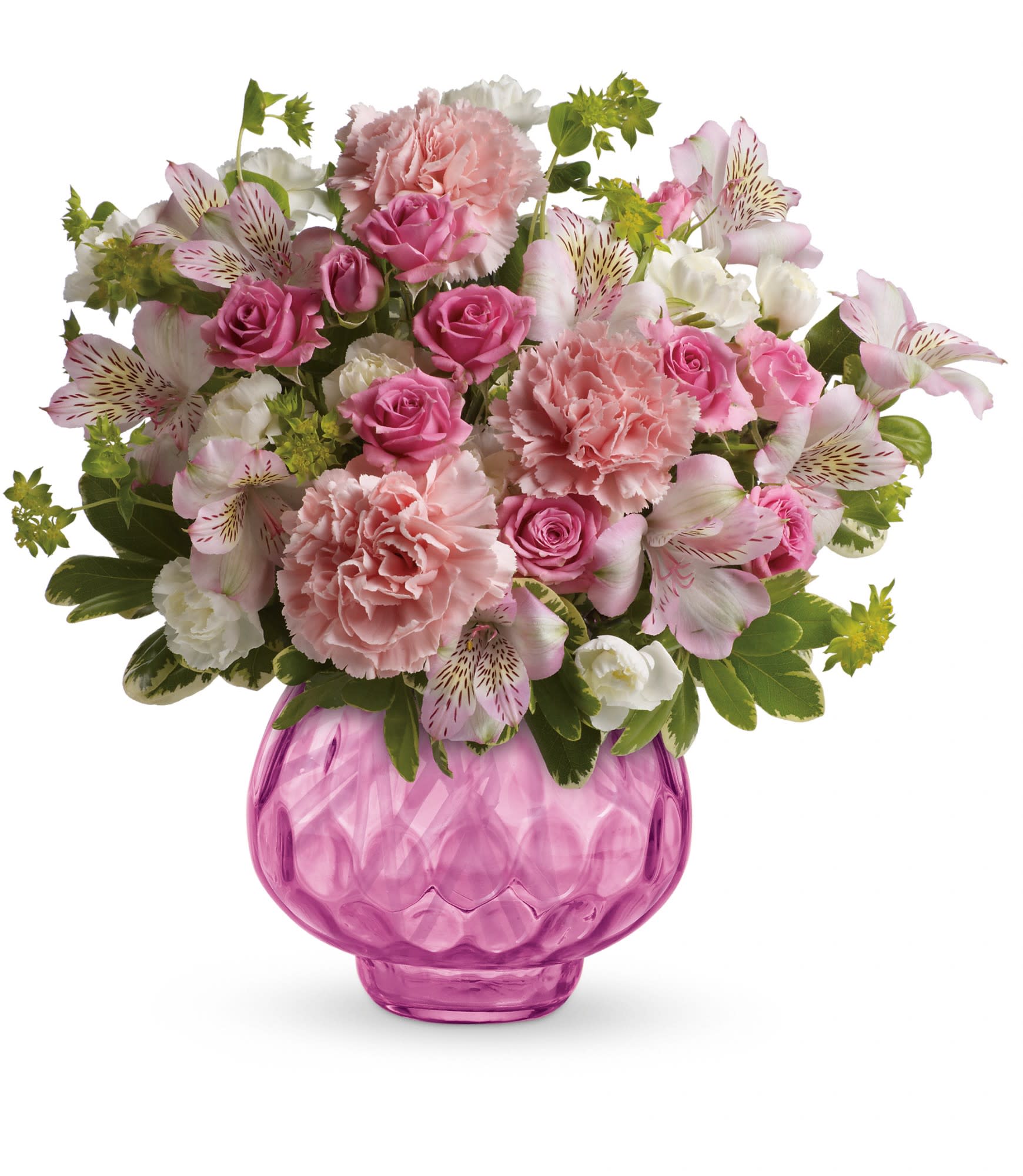 Pink carnations, spray roses, and white alstroemeria in a round pink glass vase