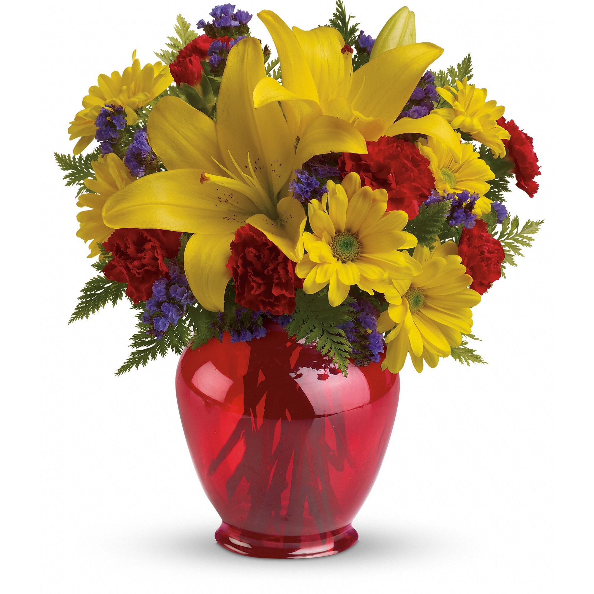 Arrangement of yellow lilies and daisies with red carnations in a red glass vase