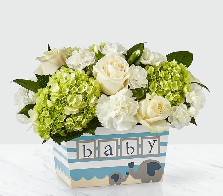 Darling Baby Boy Bouquet - Welcome their baby boy with a bouquet that says “Hello, little man!” This arrangement features a stunning combination of roses, hydrangea and carnations to help the growing family celebrate their new adventure. Good bouquet is approx. 9"H x 11"W. Better bouquet is approx. 10"H x 13"W. Best bouquet is approx. 11"H x 15"W.