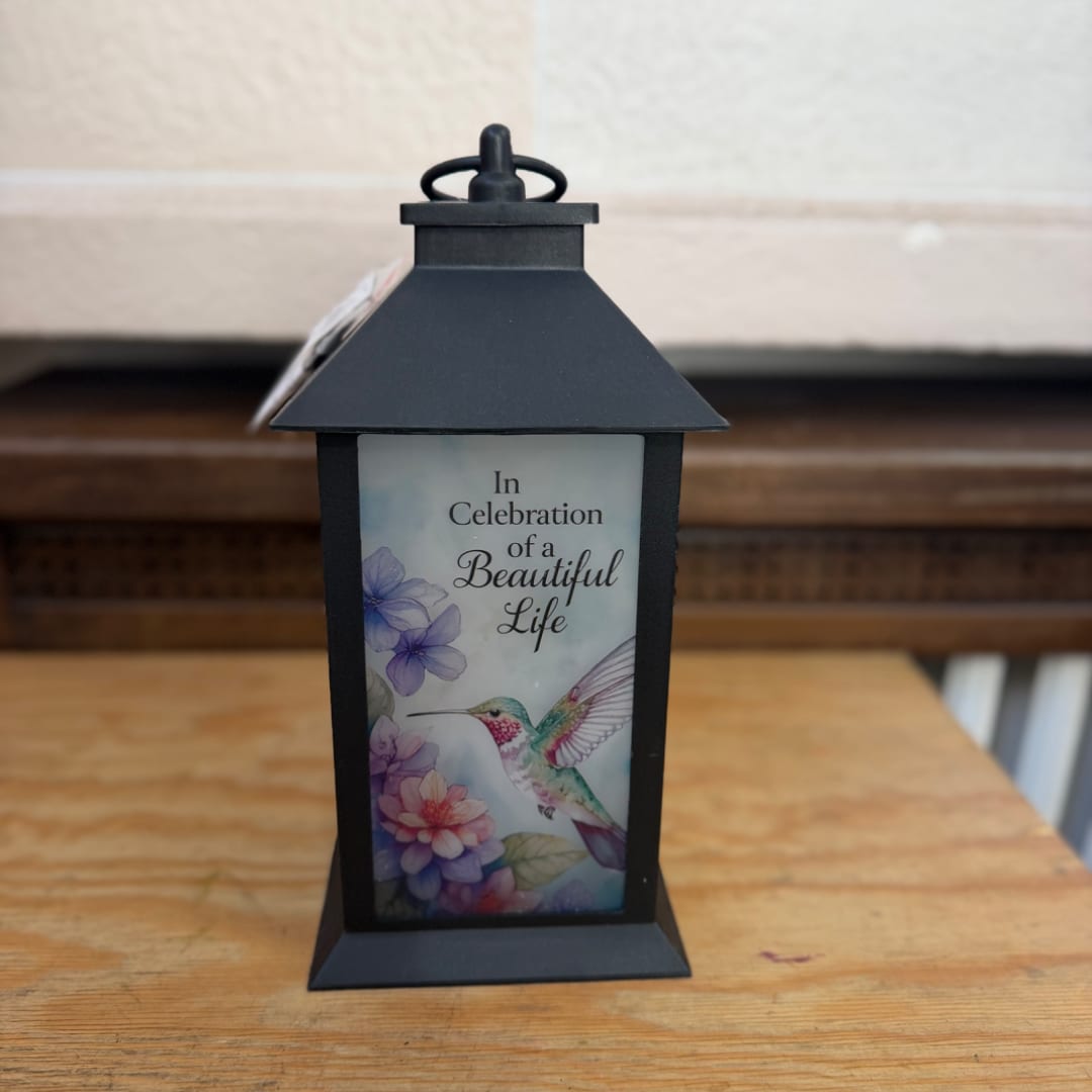 Black memorial lantern with a hummingbird and floral tribute panel