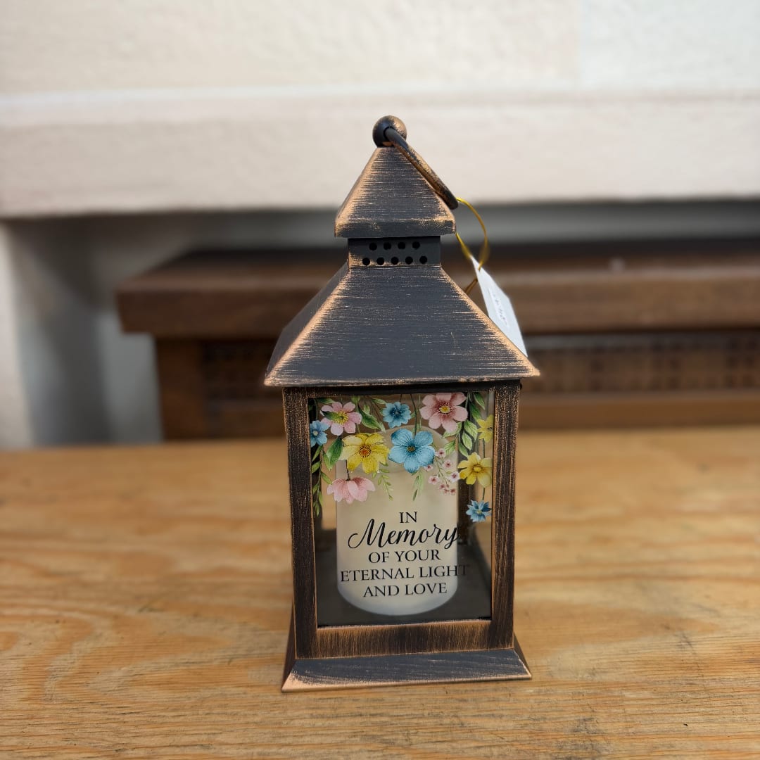 Decorative lantern with a memorial candle inside