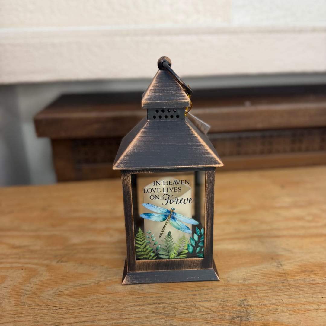 Decorative lantern with a memorial message and dragonfly design