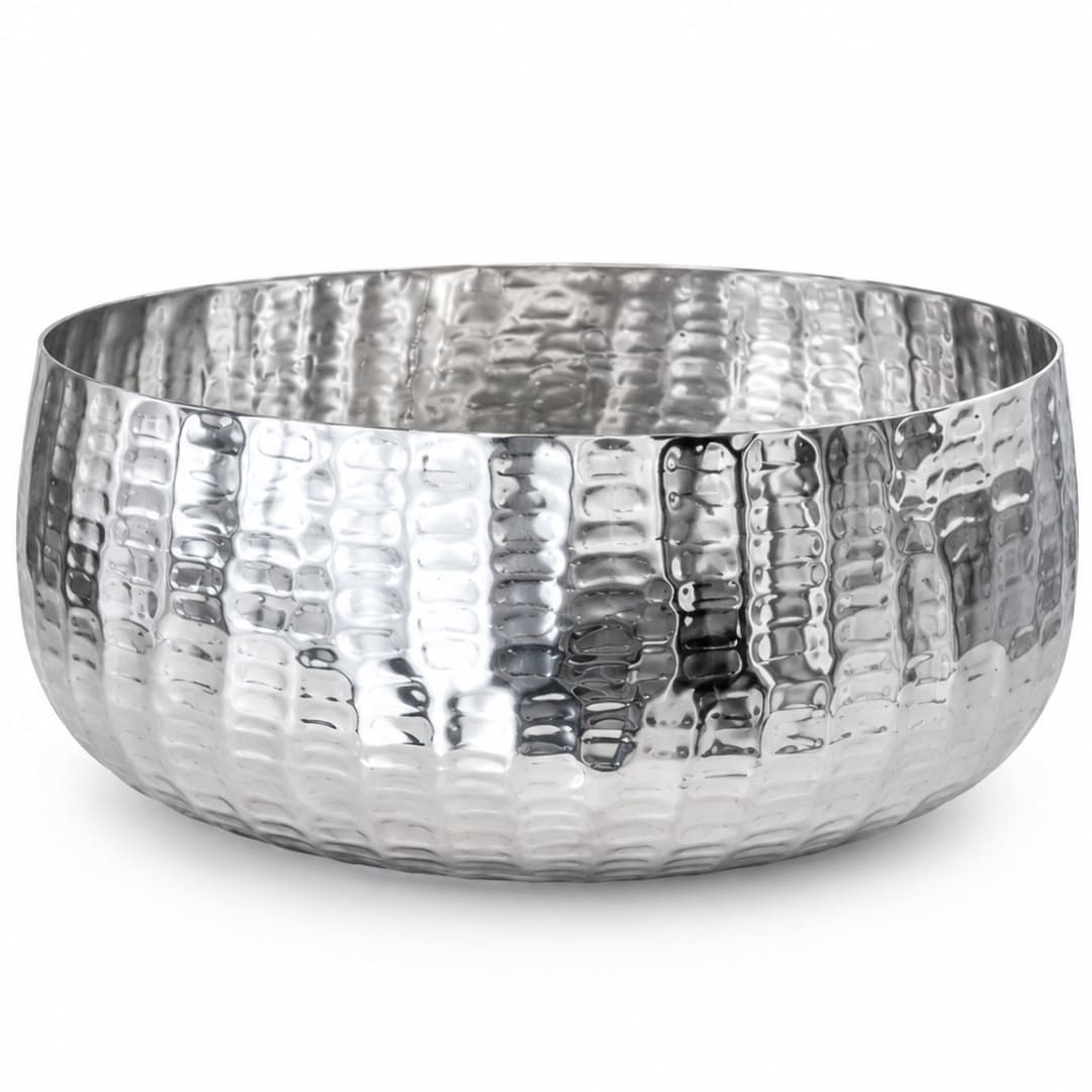 Hammered silver bowl on a white background