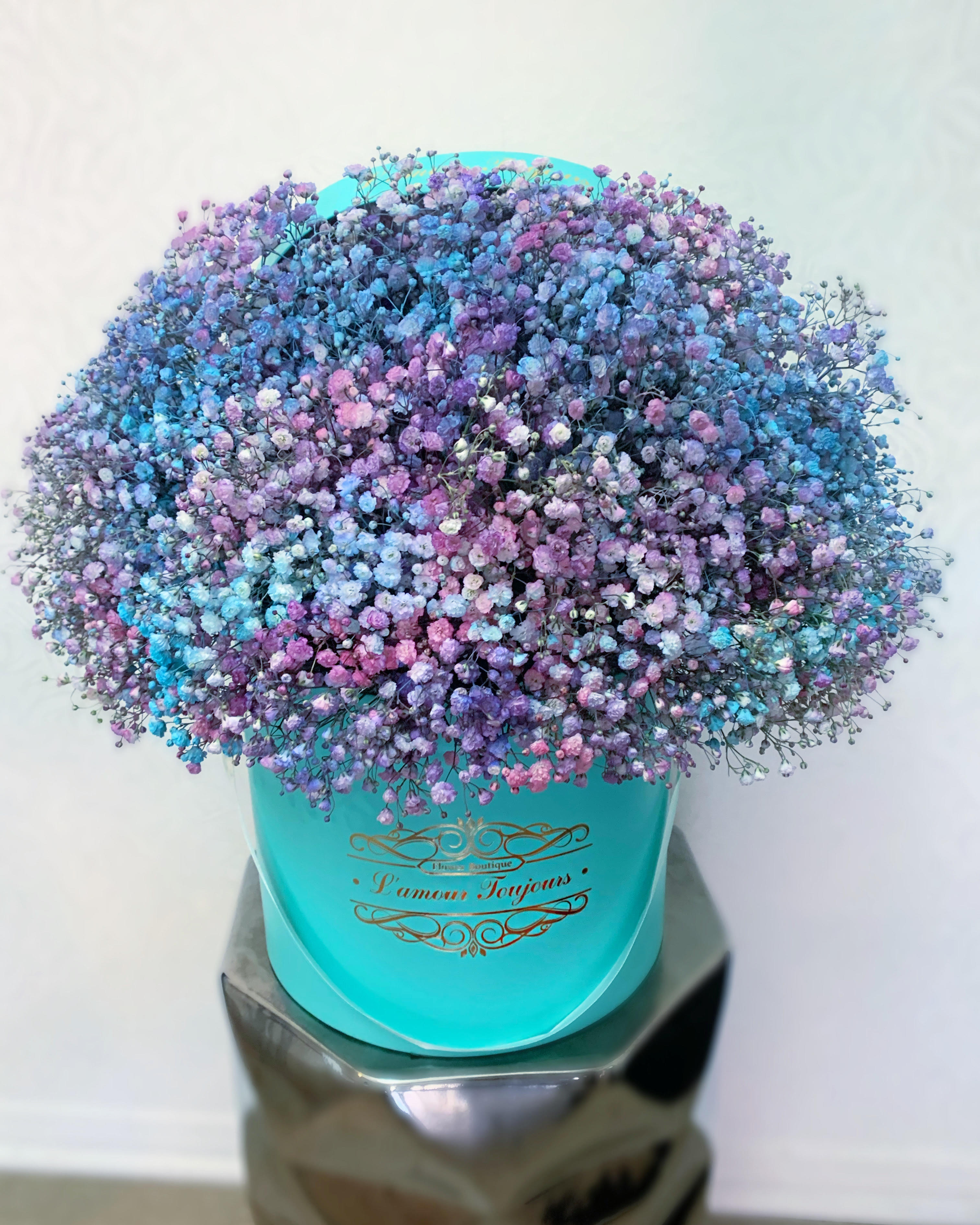 Large bouquet of pastel baby’s breath in a turquoise box