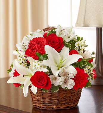Peace, Prayers &amp; Blessings - Red and White - Product ID: 95407  Send a little bit of heaven on earth with this peaceful red and white sympathy bouquet. A serene basket arrangement of roses, lilies, alstroemeria and carnations is accented with a pair of elegant dove picks to offer a comforting tribute during times of sorrow. Graceful red and white arrangement of roses, lilies, alstroemeria, carnations, mini carnations and monte casino, accented with variegated pittosporum and myrtle Hand-arranged in a willow handled basket with a pair of peaceful white dove picks.  Lilies may arrive in bud form and will open to full beauty over the next 2-3 days * Our florists select the freshest flowers available. If the flower or floral container shown online is not available, a similar flower or container will be used.