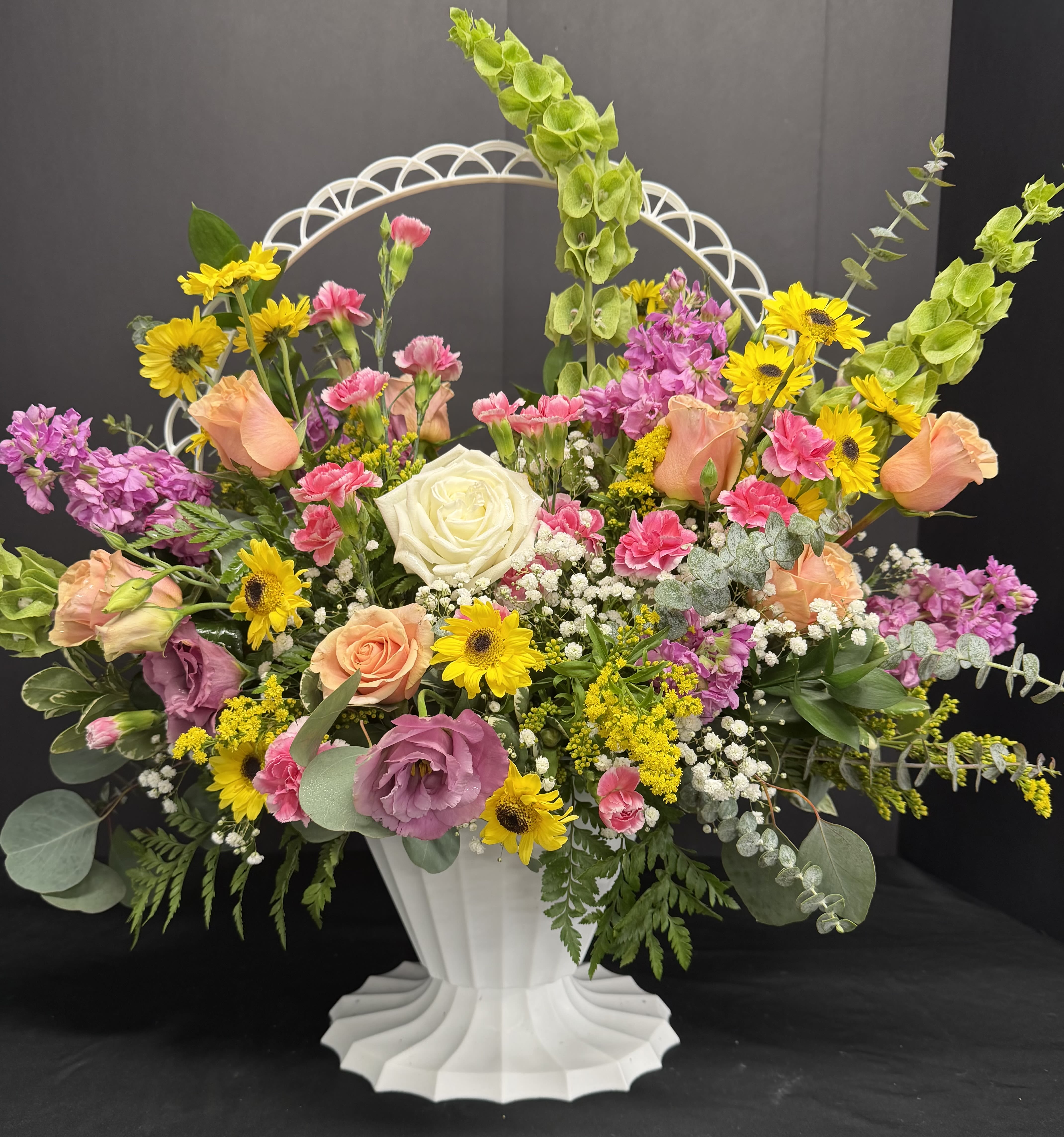 Legacy of Love - Designed with beautiful blooms to send love and sympathy to family or friends. blooms may vary but the same theme and feel will be created for you.