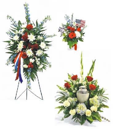 Floral standing sprays with red, white, and blue flowers and an urn centerpiece
