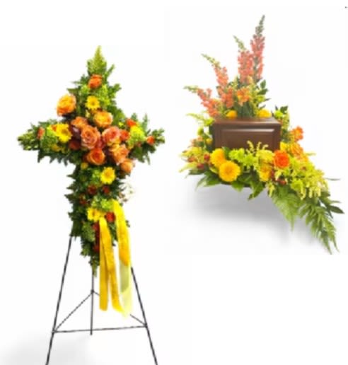 Two standing floral sprays with orange and yellow flowers on easels