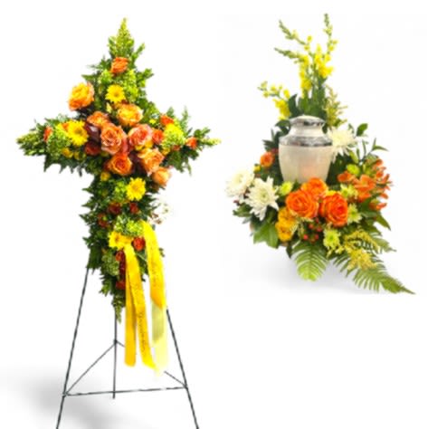 Standing floral cross and urn arrangement with orange and yellow flowers