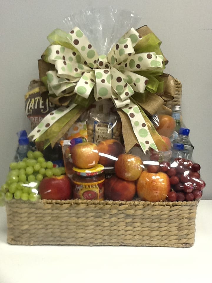 Fruit and snack gift basket with a large polka-dot bow