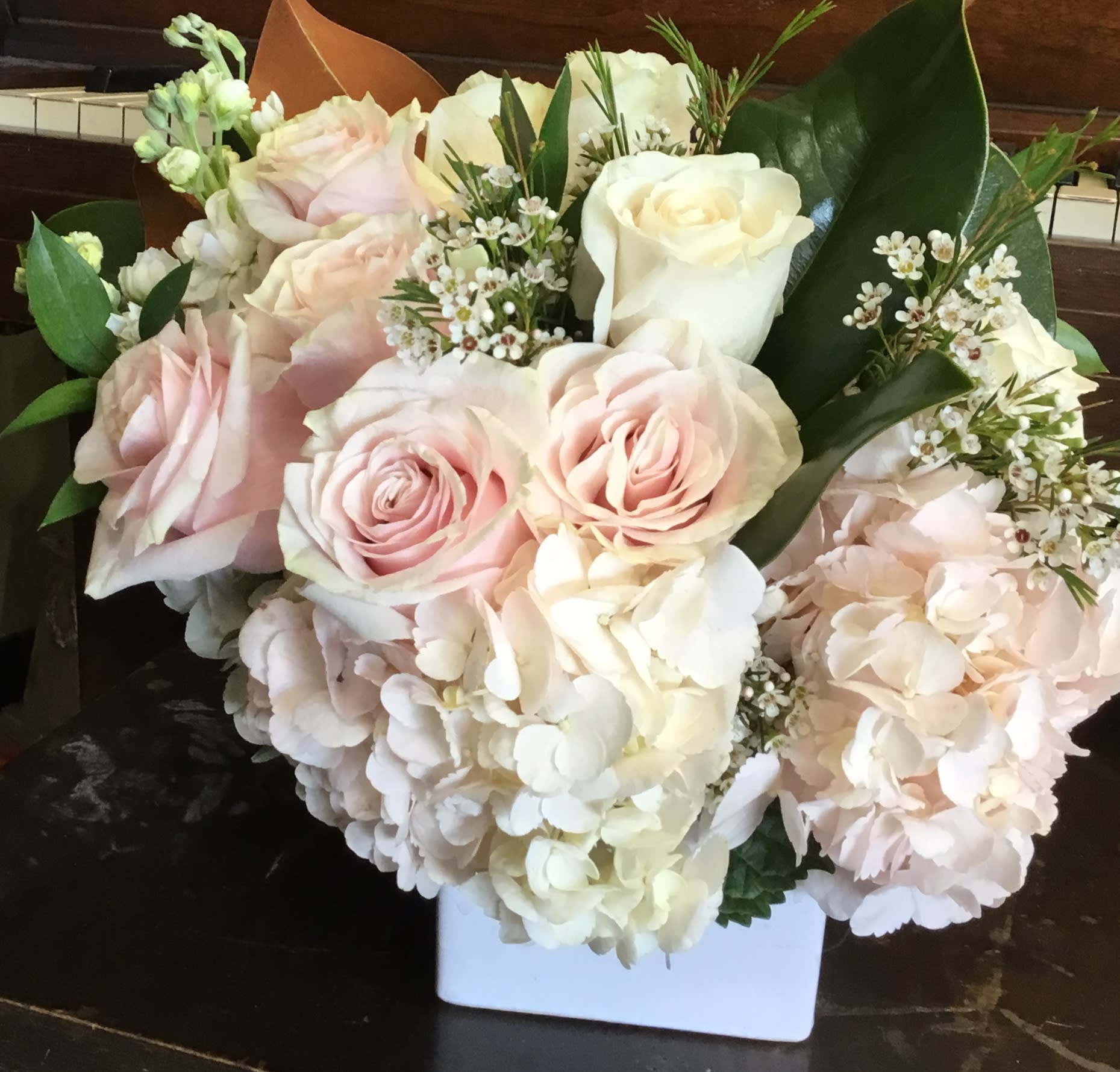 Blush and white rose bouquet with hydrangeas in a white box