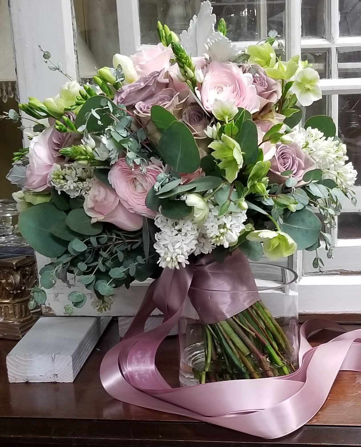Bridal Bouquet - Lush bouquet for the bride. Roses, lilac, stock, hellebores and eucalyptus. 