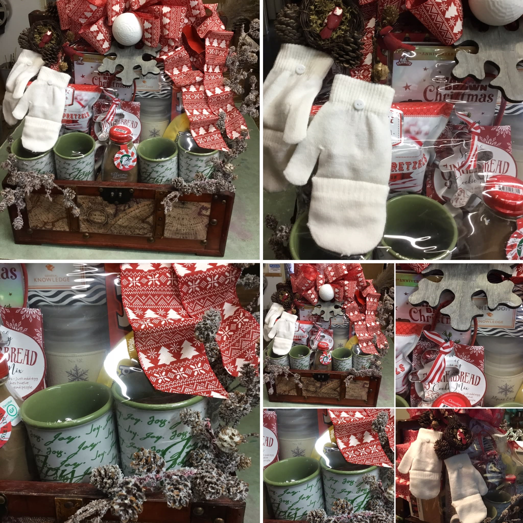 Christmas gift basket with mugs, candy, gloves, and ribbon