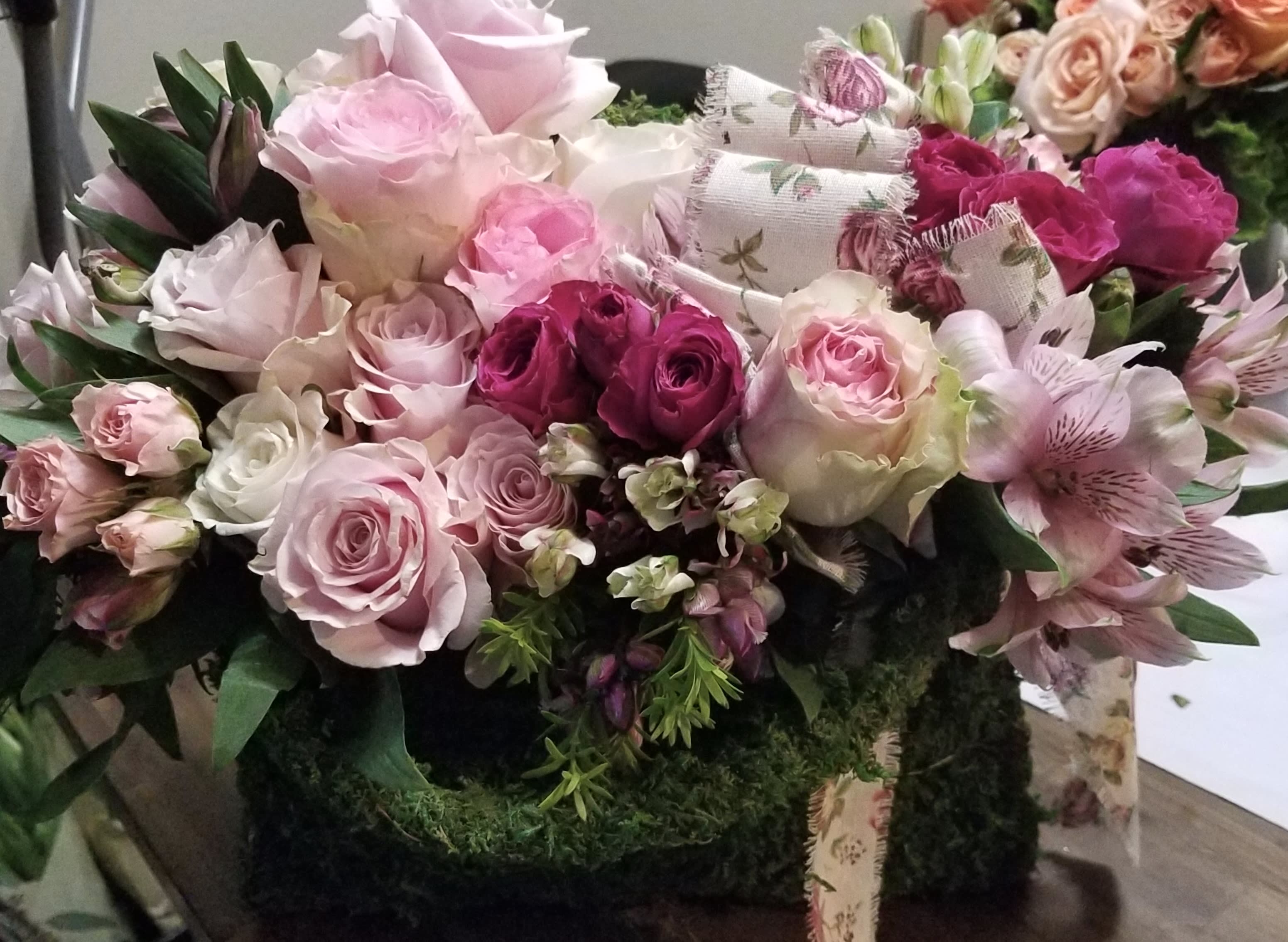 Pink and white rose bouquet with alstroemeria and ribbon