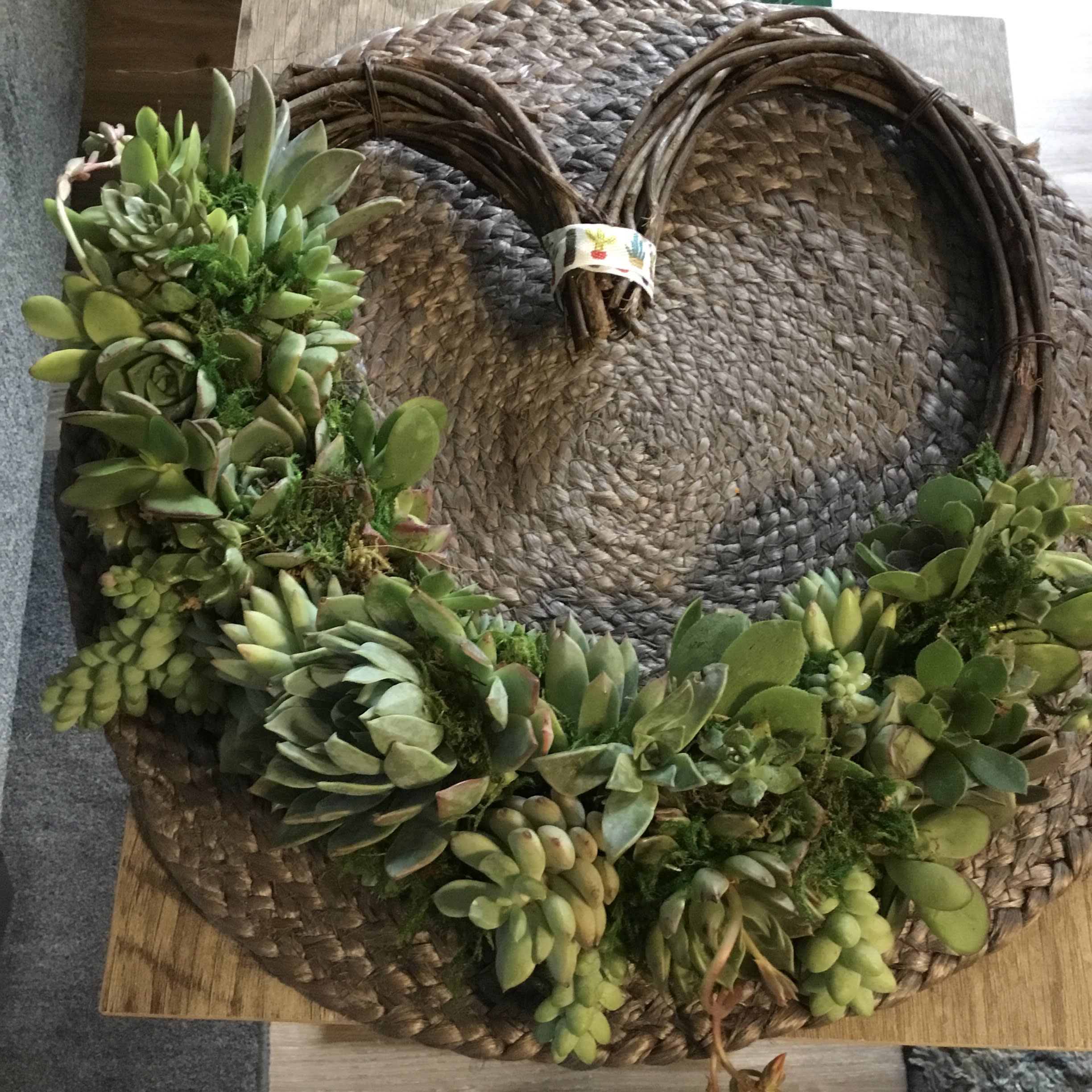 Succulent wreath on a woven straw base
