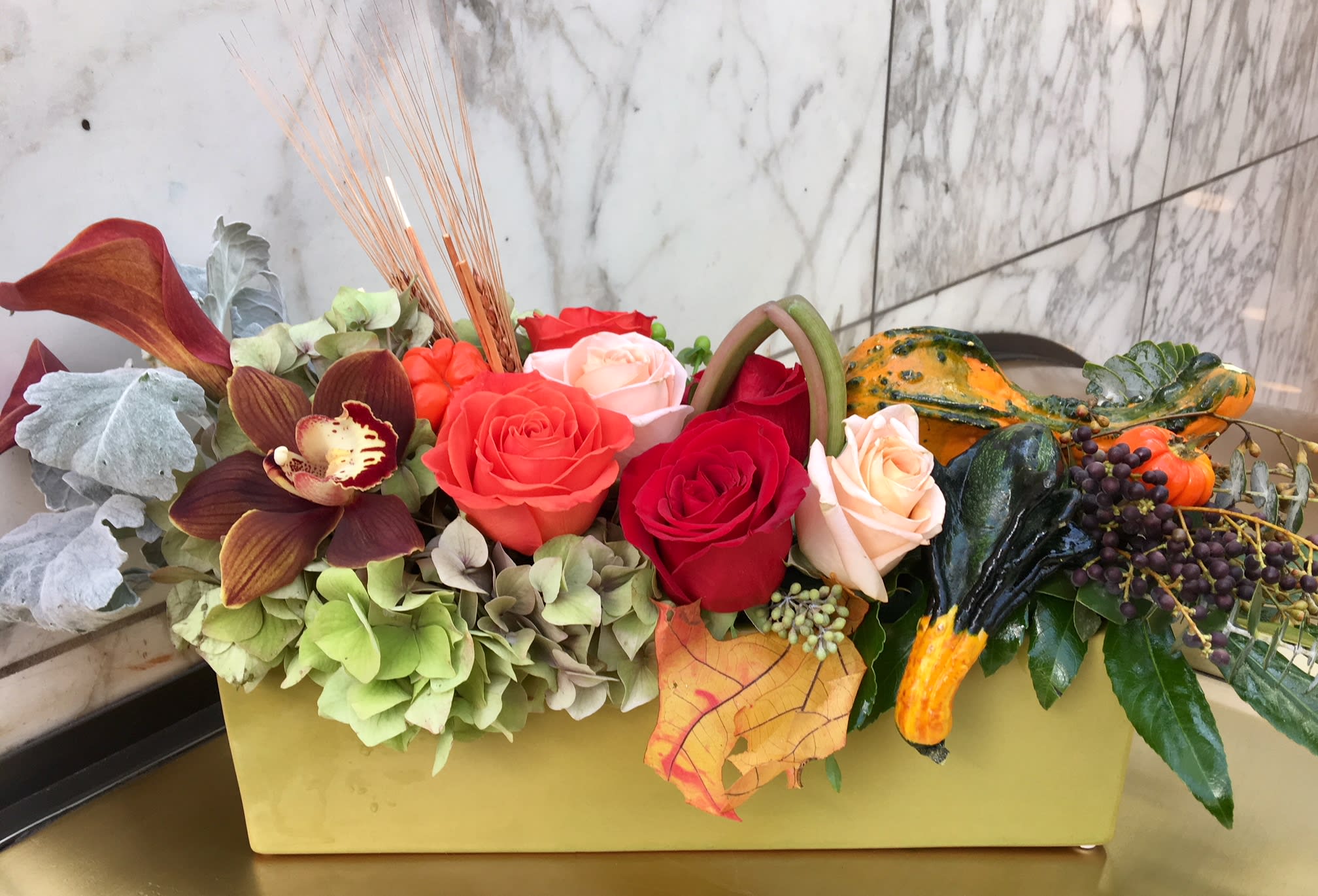 Pumpkin Spice  - Majestic arrangement, filled with bright orange, yellow and red flowers.