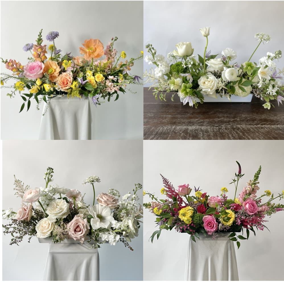 Whimsical Wildflower Tray – Custom Colors Available - Looking to elevate your next dinner party or family gathering? Our custom meadow-style floral tray arrangements are designed to captivate and charm. Each piece is thoughtfully handcrafted in a sleek black tray measuring approximately 13.5" long by 4" wide, with lush blooms and natural textures that spill outward in a whimsical, garden-fresh display.  Let us know your color preferences or request the tray to be painted in white or gold—we’ll do our best to match your vision. If no preferences are given, our floral designers will create a stunning arrangement using a seasonal color palette of their choice.  Perfect for holiday dinners, wedding showers, birthdays, or just because, this custom floral centerpiece brings a breath of the outdoors to your table. Have a longer table? Buy 2 or 3 and let us know if you would like them designed to connect or sit separately. 