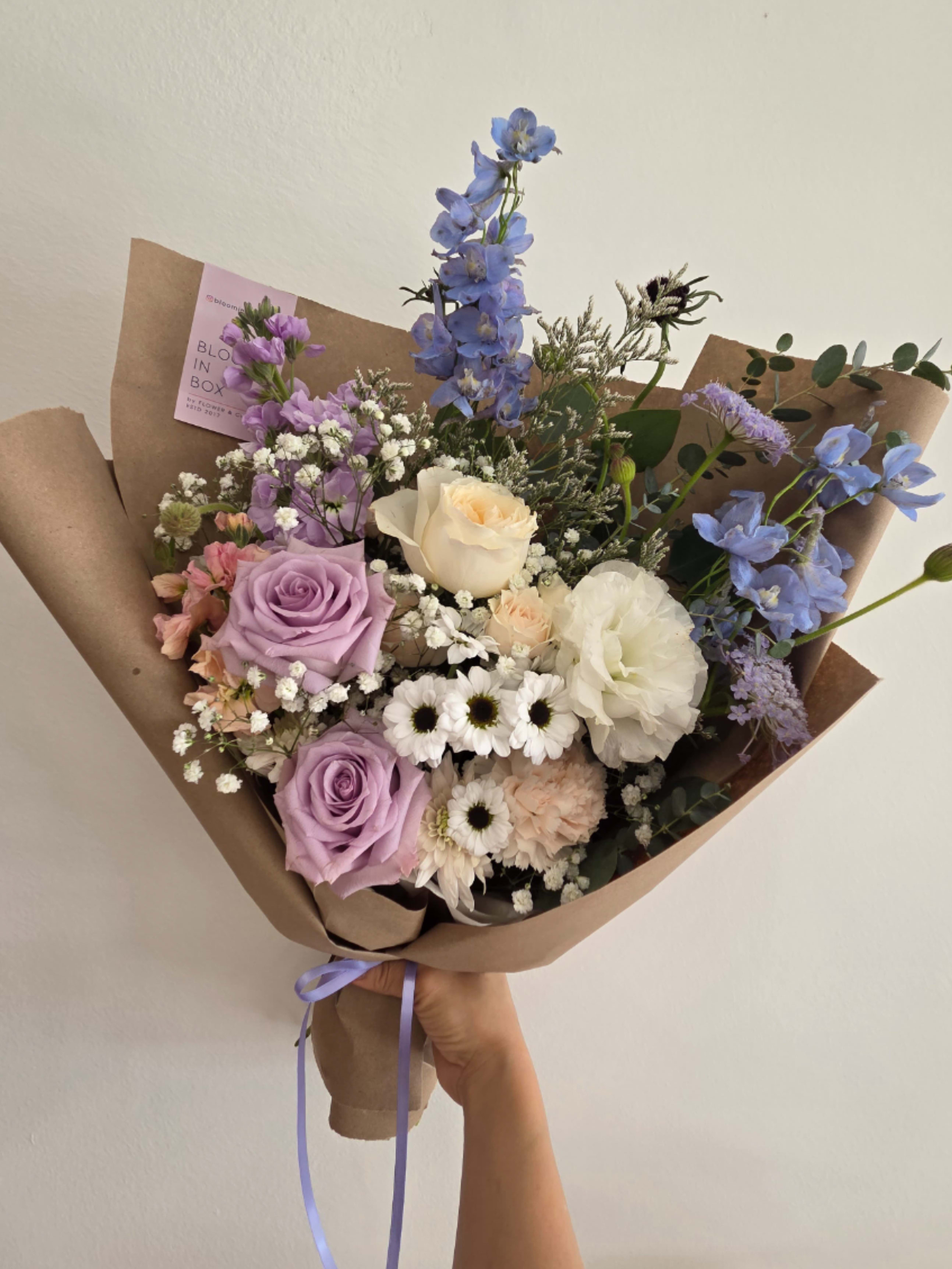 Creamy Lavender Blue Hand-tied Bouquet  - Store Hours Mon–Fri: 9:30 a.m. – 6:00 p.m. Sat: 9:00 a.m. – 4:00 p.m. Sun: Closed 
