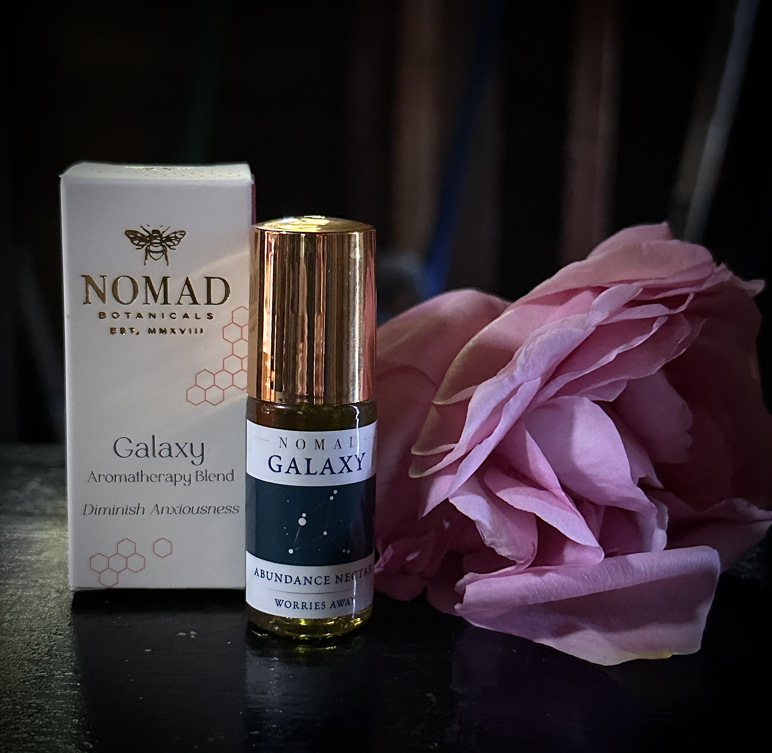 Galaxy Essential Oil Blend by Nomad Botanicals - Aromatherapy, apply around your heart and to your wrists for an immediate lift of spirit and worries away. Made in Petaluma, CA by Nomad Botanicals.