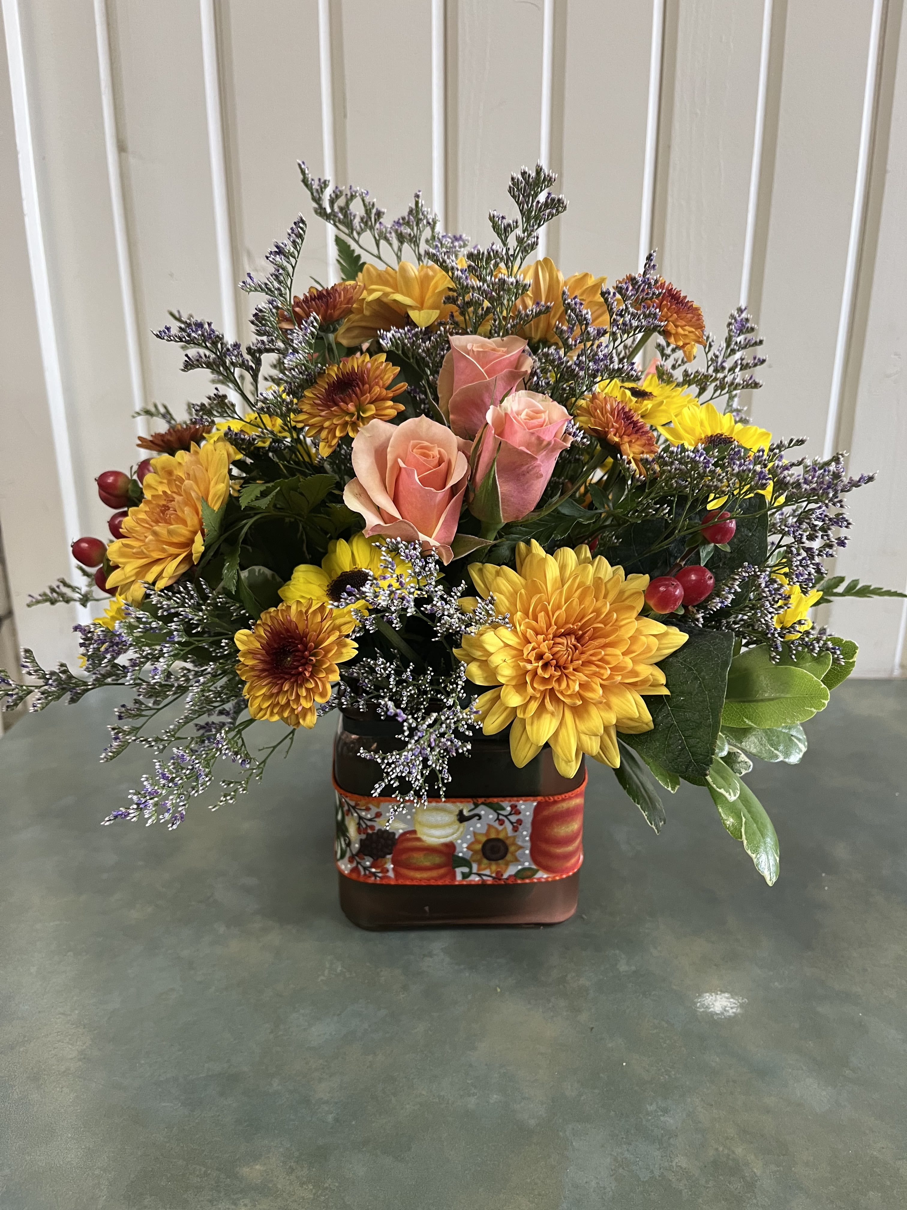 Fall Blooms Cube - Assortment of fall colored flowers in a glass cube