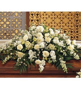 Pure White Casket Spray [TF194-1] - This casket spray with its array of white carnations, larkspur, asters and stock adds a pure and loving gesture to the service.  One casket spray arrives decorated with white carnations, larkspur, lisianthus, asters and stock, and simple foliage.  Approximately 45" W x 36" H  Orientation: One-Sided      As Shown : TF194-1  