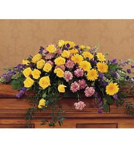  Eternal Hope Casket Spray [TF204-3] - This bright and beautiful casket spray with its yellow roses and gerberas offers the notion that hope is eternal.  One half-couch casket spray arrives filled with yellow roses and gerberas, purple larkspur, variegated purple carnations and soft foliages.  Approximately 60" W x 16" H  Orientation: All-Around      As Shown : TF204-3  