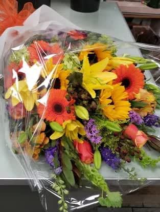 [PRESENTATION BOUQUET - FALL FLOWERS]  PREMIUM - A LARGE MIXED PREMIUM ARM BOUQUET OF FRESH FLOWERS IN A FALL THEME WITH SHEER RIBBON BOW AND DECORATIVE SHEER WRAP -  BOUQUETS ARE FILLED TO SPECIFIED ORDER VALUE.  AS SHOWN- PREMIUM :  $175.00 DELUXE :  $100.00 