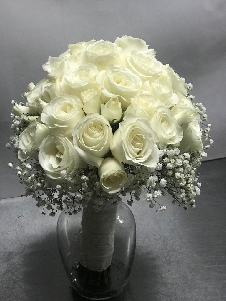 White rose bouquet in a glass vase
