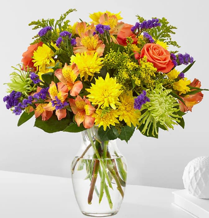 Marmalade Skies Bouquet - Flowers of yellow and green, and pops of orange and purple. Full of color and texture, all you need is love and our Marmalade Skies Bouquet.