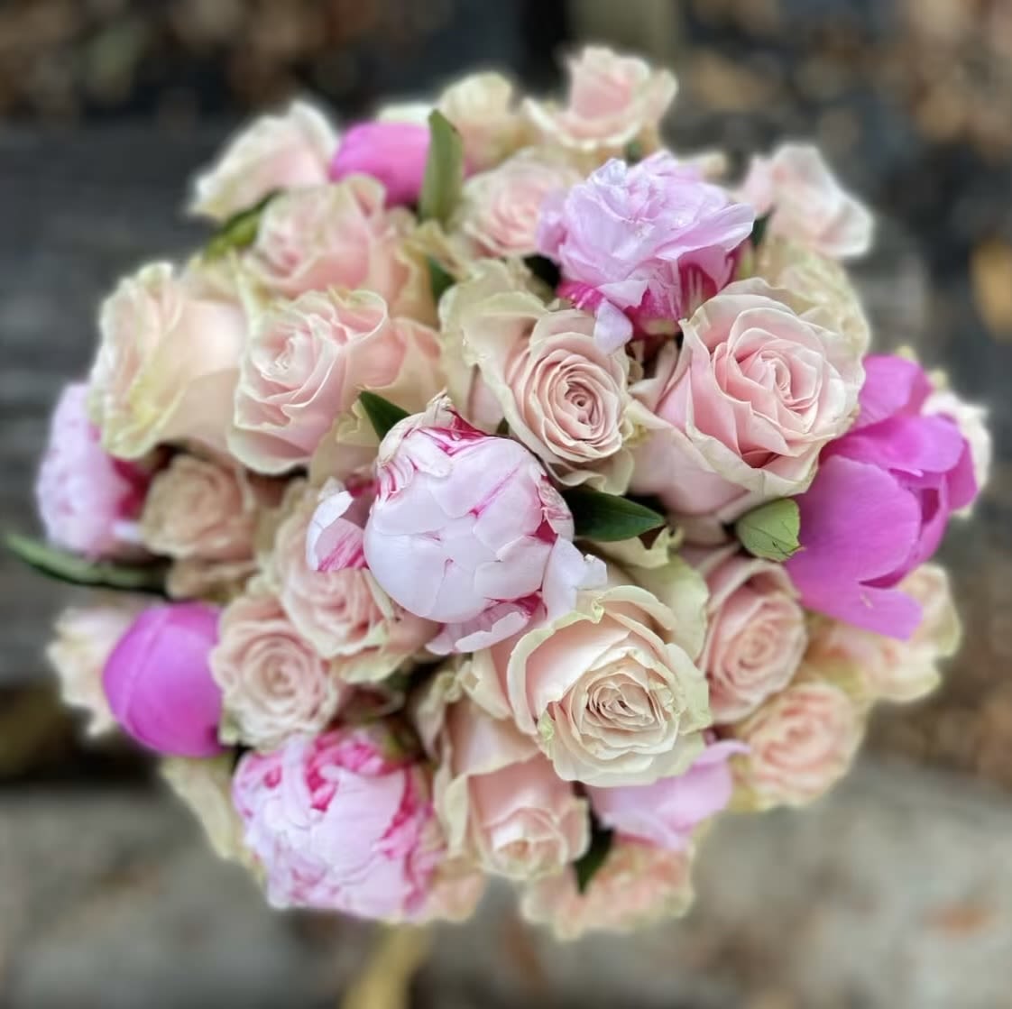 Bouquet of pale pink roses and pink peonies
