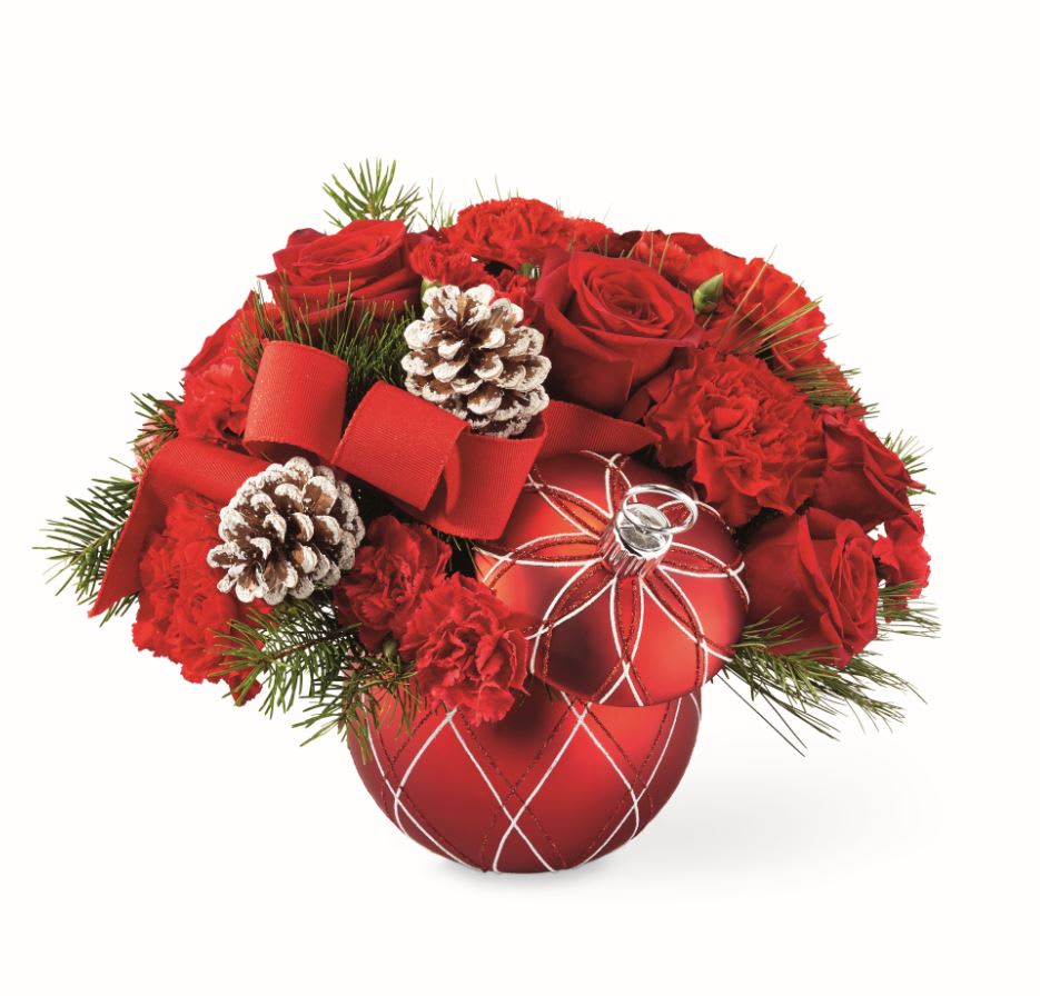 MAKING SPIRITS BRIGHT™ BOUQUET - Bright red blooms bursting from a ceramic ornament ball, with a raised white and red glitter pattern, will fill anyone with the holiday spirit. 