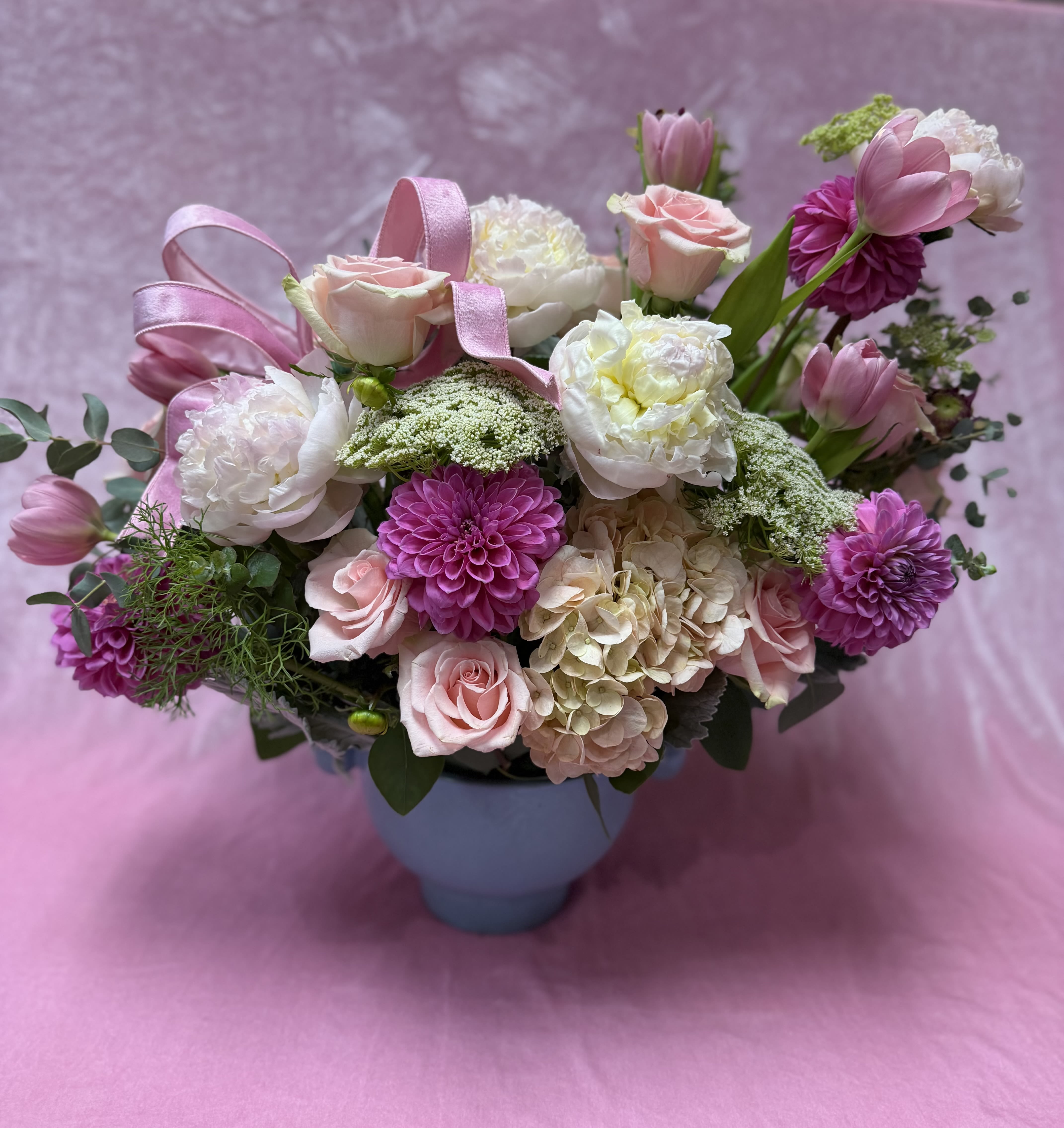 ISABELLA - PEONIES, TULIPS,DALHIAS,ROSES,HYDRANGEAS, ETC ETC. IN DUSTY BLUE CERAMIC VASE .