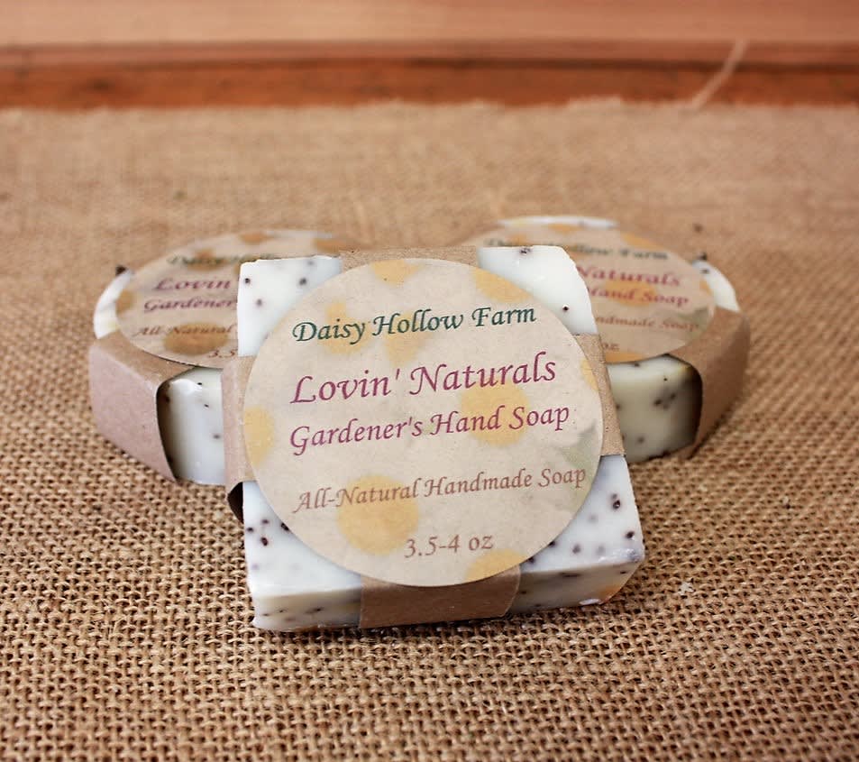 Wrapped bars of handmade soap with garden-themed labels
