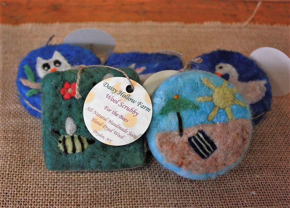 Handmade wool scrubby soaps with bee and flower designs