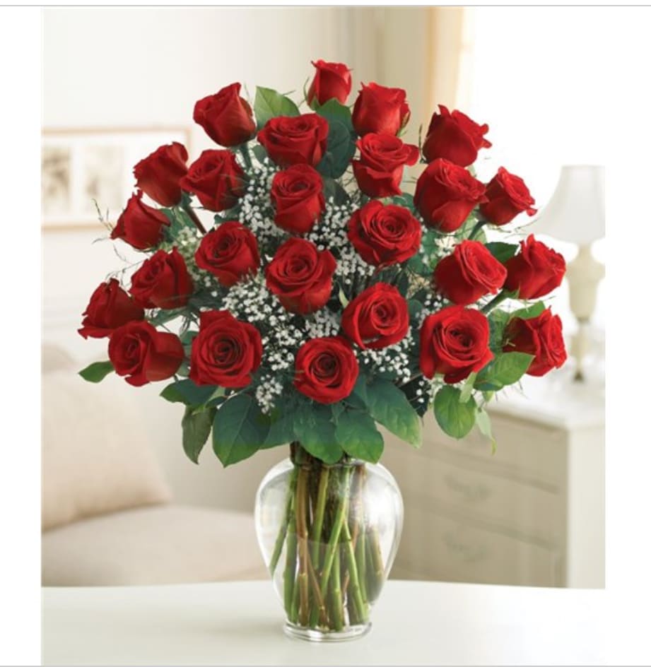 Ultimate Elegance Premium Long Stem Red Roses - Product ID: 95432  Because your sweetheart deserves to be romanced with all the love in your heart, send a luxurious bouquet of the freshest premium long-stem red roses. Whether you choose two, three or four dozen, each truly original arrangement is hand-gathered by our select florists in a classic glass vase to help you express yourself perfectly. Premium long-stem red roses, artistically arranged by our expert florists and accented with fresh gypsophila Available in bouquets of two dozen, three dozen and four dozen roses 2 dozen arrangement measures approximately 23"H x 18"L 3 dozen arrangement measures approximately 23"H x 18"L 4 dozen arrangement measures approximately 23"H x 18"L Hand-arranged in a classic clear glass vase; vase measures 11"H Our florists hand-design each arrangement, so colors, varieties, and container may vary due to local availability
