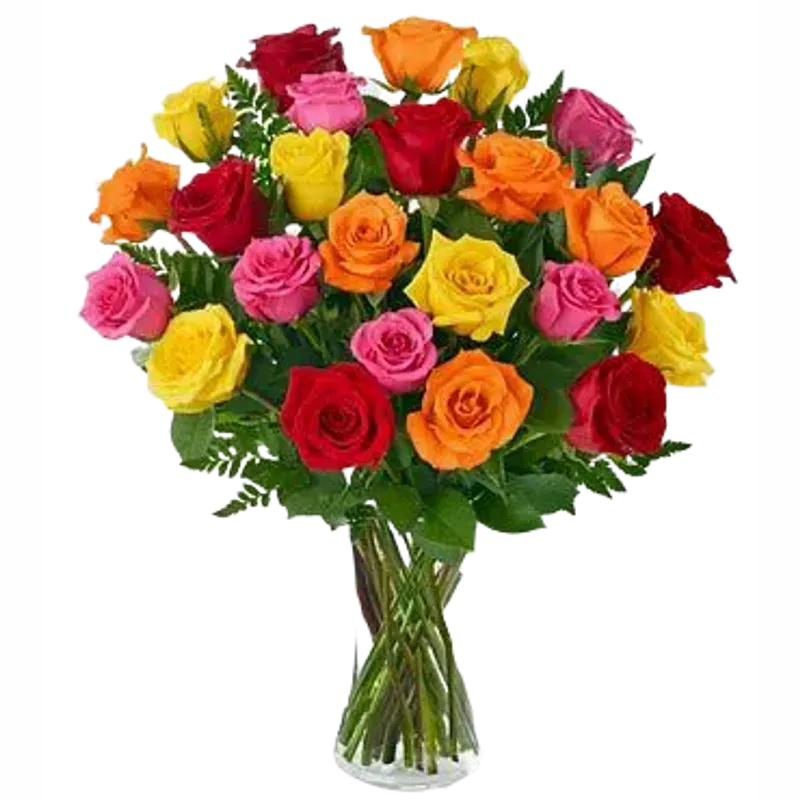 Bouquet of multicolored roses in a clear glass vase