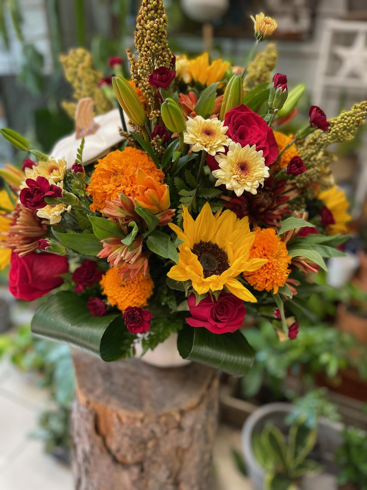 Lush Pumpkin Patch - Assorted mixed fall flowers in a ceramic vase