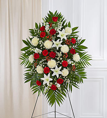 Deepest Sympathies Red &amp; White Standing Spray - Product ID: 91289  With red flowers that symbolize love and white flowers that symbolize reverence, this beautifully crafted standing spray conveys all the love and sympathy you feel deep in your heart. Our expert florists use only the freshest blooms for an arrangement that reflects your compassion and support. Standing spray arrangement of fresh red and white flowers such as roses, hybrid lilies, carnations and more Appropriate for family, friends and business associates to send directly to the funeral home Our florists use only the freshest flowers available, so colors and varieties may vary Large measures approximately 54"H x 36"L without easel Medium measures approximately 48"H x 36"L without easel Small measures approximately 42"H x 36"L without easel