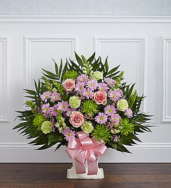 Heartfelt Tribute Pastel Floor Basket Arrangement - Product ID: 91399   When youâre trying to find a way to express your deepest sympathy, this pastel sympathy floor basket helps you beautifully say what is in your heart. Our expert florists use only the freshest blooms, including pastel roses, gladiolas, snapdragons and more, to show your love and concern for family, friends and colleagues during a difficult time. Floor basket arrangement of fresh pastel roses, gladiolas, snapdragons, mums, carnations, daisy poms, heather and more Appropriate for family, friends or business associates to send directly to the funeral home Our florists use only the freshest flowers available, so colors and varieties may vary Large arrangement measures approximately 32"H x 40"L Medium arrangement measures approximately 32"H x 38"L Small arrangement measures approximately 32"H x 32"L