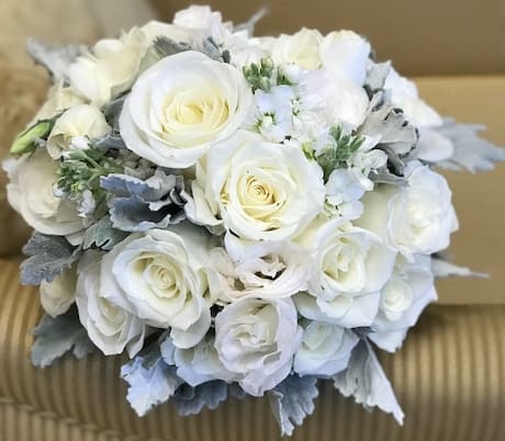 White rose bouquet with pale blue-gray foliage
