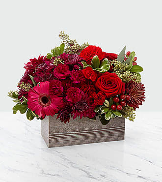 Red and pink mixed flower arrangement in a rectangular wooden box