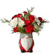 North Pole Magic Bouquet - Naughty or nice, everyone deserves a visit from Old Saint Nick!   And along with these gorgeous roses, carnations, and cushion pompons, they’ll get just that.