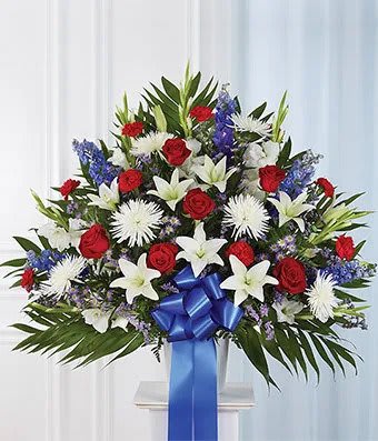 Red, White &amp; Blue Fan Shaped Basket - Convey your deepest condolences for a beloved veteran with this touching tribute.