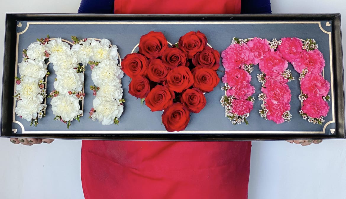 Tray with floral letters in white and pink and a red rose heart
