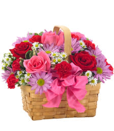  “Blossom Boutique Basket” - A Charming Luxury Garden in a Handwoven Basket  Delight someone special with our Blossom Boutique Basket, a radiant blend of premium blooms designed to feel like a hand-gathered garden of joy. Lush pink roses, romantic red roses, soft lavender daisies, cheerful mini daisies, and a touch of velvety red carnations come together in a timeless hand-woven basket, finished with an elegant pink bow.  Perfectly balanced in color, texture, and fullness, this arrangement offers a luxury presentation with a warm, heartfelt touch — ideal for birthdays, thank-yous, get-well wishes, or simply making someone’s day brighter.   Luxury Features  Premium red &amp; pink roses for elegance and romance  Soft lavender daisy poms for a garden-fresh feel  White mini daisies for charm and contrast  Hand-arranged in a natural woven keepsake basket  Full, lush, and perfectly shaped for an elevated presentation  Finished with a designer bow for a polished, gift-ready look   Perfect For  Birthdays &amp; celebrations  Get-well &amp; thinking-of-you gifts  Mother’s Day  Thank-you gestures  Hospital or nursing home deliveries  Anyone who loves bright, cheerful garden florals