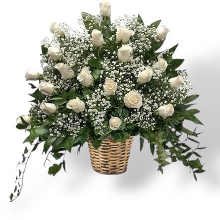 Pure Grace Sympathy Basket - A timeless expression of elegance and remembrance, this sympathy basket features an abundance of radiant white roses nestled among clouds of delicate baby’s breath. Accented with lush greenery, the arrangement offers a serene and graceful tribute, perfect for honoring the memory of a loved one. Presented in a natural woven basket, this design exudes both beauty and comfort.  