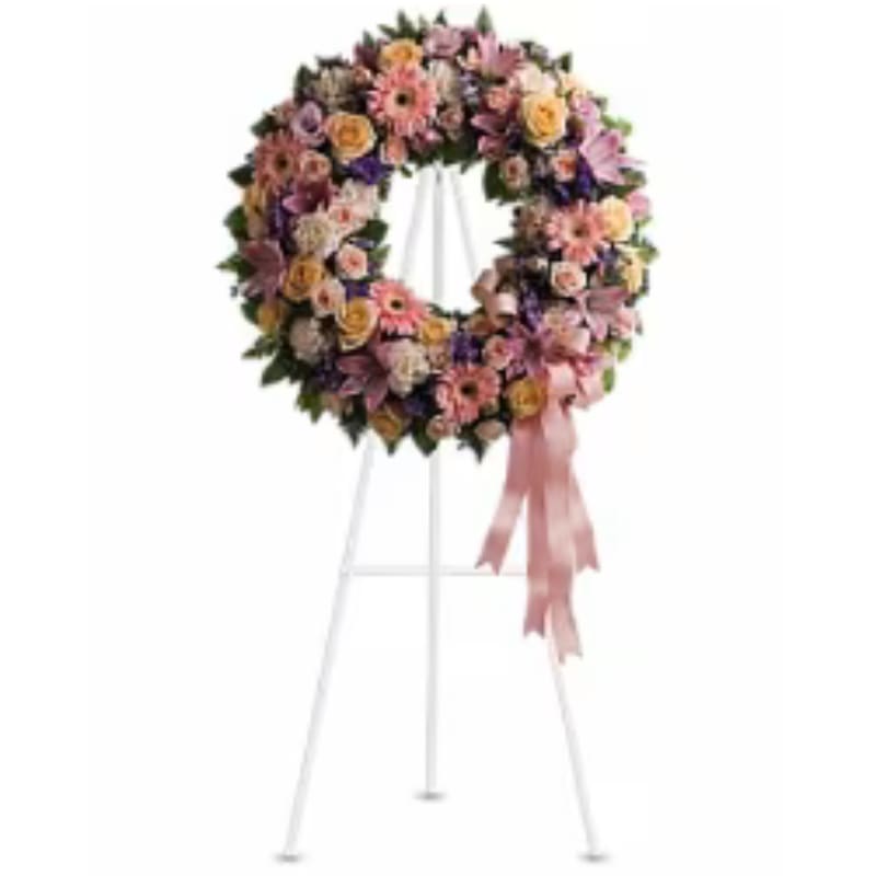 Graceful Wreath - Family and friends will recollect how special their loved one was with this gentle and timeless circle of fragrant blooms to celebrate sweet memories.